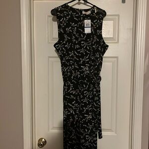 Net Michael kors floral yellow and white jumpsuit.